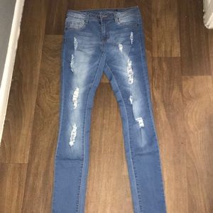 Light colored ripped jeans